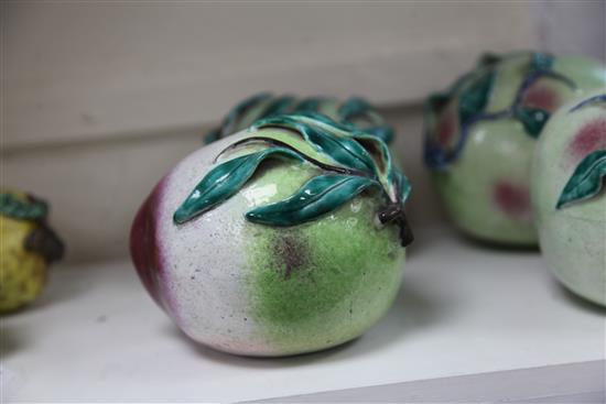 A pair of Chinese enamelled porcelain models of peaches, 19th century, 16cm